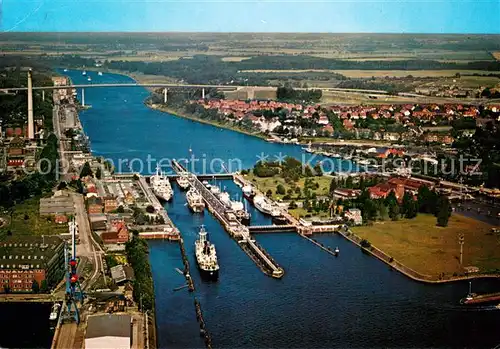 AK / Ansichtskarte Holtenau_Kiel Holtenauer Schleusen mit Hochbruecken Fliegeraufnahme Holtenau Kiel