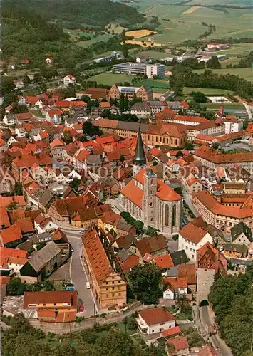 AK / Ansichtskarte Muennerstadt Stadtpfarrkirche St Maria Magdalena Fliegeraufnahme Muennerstadt