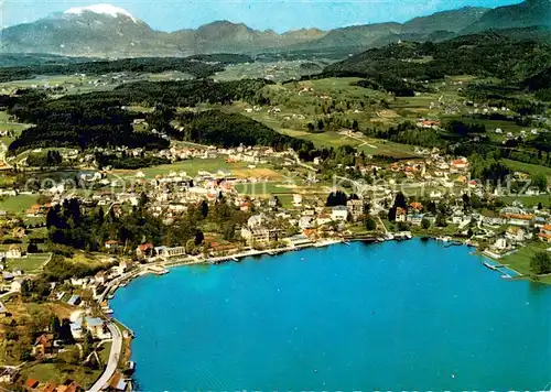 AK / Ansichtskarte Velden_Woerthersee Veldener Bucht mit Baeckerteich und Dobratsch Fliegeraufnahme Velden Woerthersee