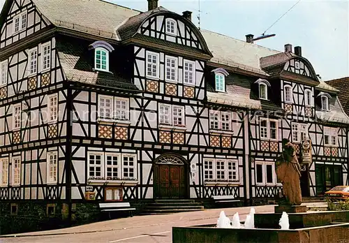 AK / Ansichtskarte Herbstein Gasthaus Pension Metzgerei Stadtschenke Fachwerkhaus Brunnen Herbstein