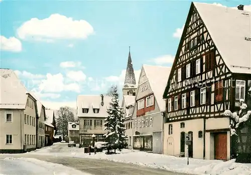 AK / Ansichtskarte Lorch_Rheingau Hauptstrasse mit evangelischer Kirche Fachwerkhaus im Winter Lorch Rheingau