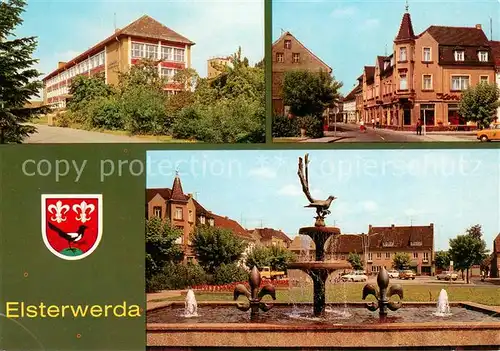 AK / Ansichtskarte Elsterwerda Etkar Andre Oberschule Hauptstrasse Wappenbrunnen am Markt Elsterwerda