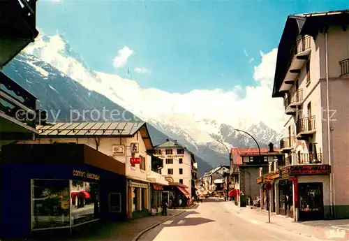 AK / Ansichtskarte Chamonix Rue Joseph Vallot Aiguille du Midi et le Mont Blanc Alpes Chamonix