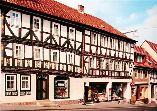 AK / Ansichtskarte Tann_Rhoen Marktplatz mit Elf Apostel Haus Fachwerkhaus Luftkurort Tann_Rhoen