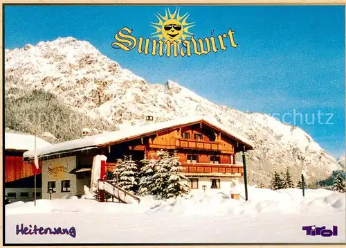 AK / Ansichtskarte Heiterwang Gaestehaus Pension Sunnawirt Winterzauber in den Alpen Heiterwang