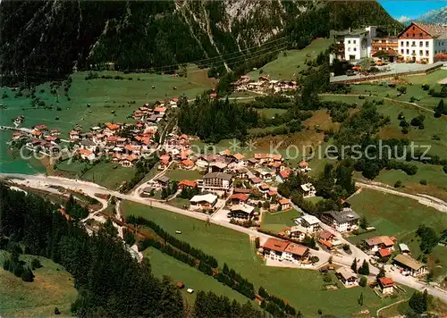 AK / Ansichtskarte Flirsch Fliegeraufnahme mit Hotel Pezina Restaurant Cafe Flirsch