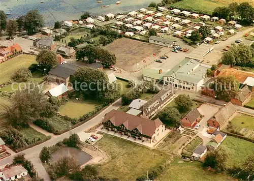 AK / Ansichtskarte Neukirchen_Oldenburg Strandhotel Ernst Campingplatz Fliegeraufnahme Neukirchen Oldenburg
