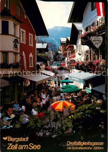 AK / Ansichtskarte Zell_See Dreifaltigkeitsgasse mit Blick zur Schmittenhoehe Hohe Tauern Zell_See
