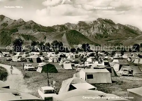 AK / Ansichtskarte Chiemsee Campingplatz Roedlgries mit Kampenwand und Hochplatte Chiemsee