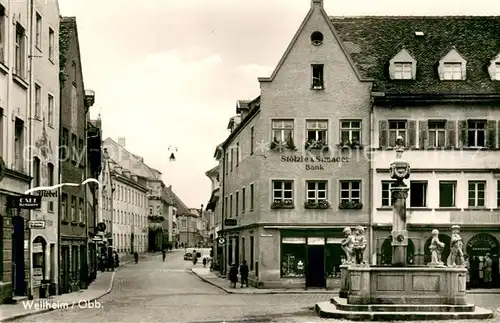 AK / Ansichtskarte Weilheim_Oberbayern Ortspartie mit Brunnen Weilheim Oberbayern