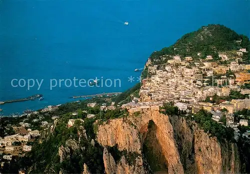 AK / Ansichtskarte Capri Panorama con la sommita del monte Castiglione e in basso il porto di Marina Grande Fliegeraufnahme Capri