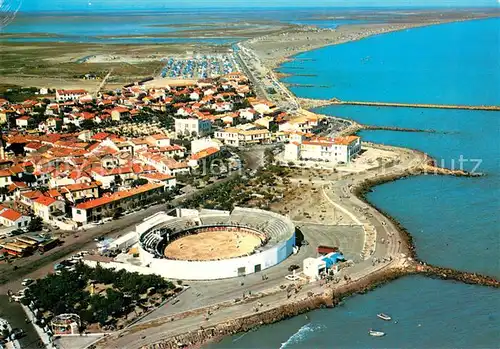 AK / Ansichtskarte Les_Saintes Maries de la Mer Vue aerienne sur lensemble de la ville Les