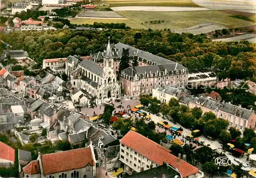 AK / Ansichtskarte Issoudun_Indre Pelerinage a Notre Dame du Sacre Coeur Vue aerienne Issoudun Indre