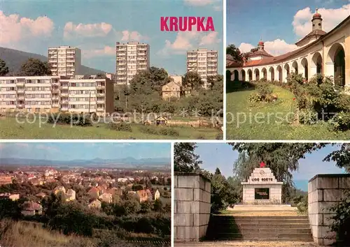 AK / Ansichtskarte Krupka Wohnsiedlung Hochhaeuser Arkaden Denkmal Stadtpanorama Krupka