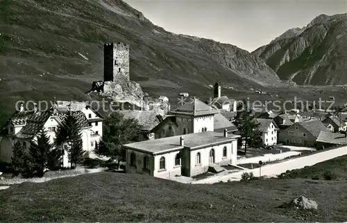 AK / Ansichtskarte Hospental Ortansicht mit Kirche und Burgruine Alpen Hospental