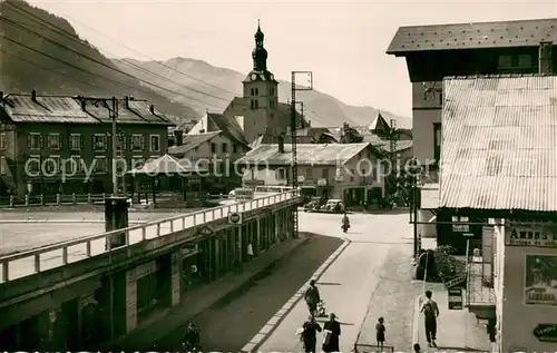 AK / Ansichtskarte Megeve Eglise Arcades de la Patinoire Megeve