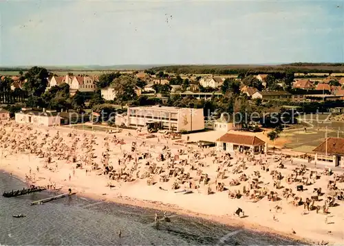 AK / Ansichtskarte Kellenhusen_Ostseebad Fliegeraufnahme mit Strand und Kurmittelhaus Kellenhusen_Ostseebad