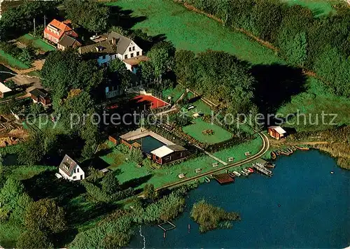 AK / Ansichtskarte Owschlag Hotel Pension Foerster Haus am See Fliegeraufnahme Owschlag