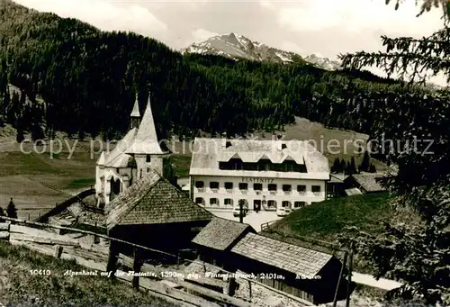 AK / Ansichtskarte Flattnitz mit Kirche und Wintertaiernock Flattnitz