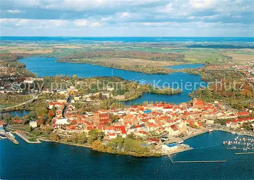 AK / Ansichtskarte Waren_Mueritz Altstadt mit Hafen an der Mueritz und Tiefwarensee Fliegeraufnahme Waren Mueritz