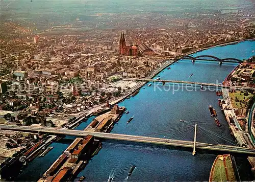 AK / Ansichtskarte Koeln_Rhein Rheinufer mit Dom Fliegeraufnahme Koeln_Rhein