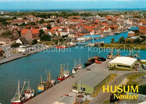 AK / Ansichtskarte Husum_Nordfriesland Fliegeraufnahme mit Hafen Husum_Nordfriesland