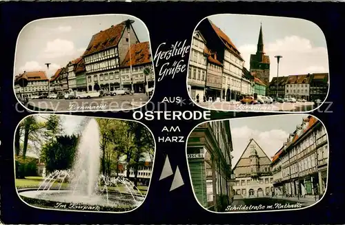 AK / Ansichtskarte Osterode_Harz Kornmarkt Kurpark Springbrunnen Rathaus Osterode_Harz