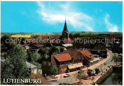 AK / Ansichtskarte Luetjenburg_Holstein Ortsansicht mit Kirche Luetjenburg_Holstein