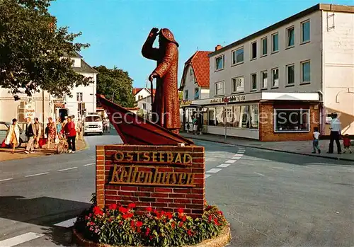 AK / Ansichtskarte Kellenhusen_Ostseebad Fischer Statue Wahrzeichen des Seebades Kellenhusen_Ostseebad