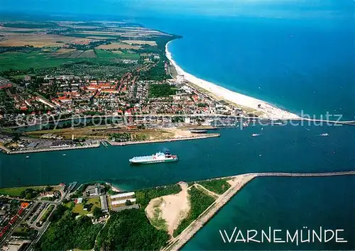 AK / Ansichtskarte Warnemuende_Ostseebad Fliegeraufnahme mit Strand Hafeneinfahrt Warnemuende_Ostseebad