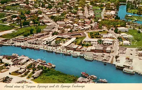 AK / Ansichtskarte Tarpon_Springs Aerial view Sponge Exchange showing Sponge Boats docked in Anclote River 