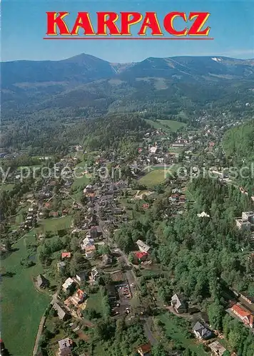 AK / Ansichtskarte Karkonosze Panorama Karpacza ze Sniezka w tle Fliegeraufnahme Karkonosze