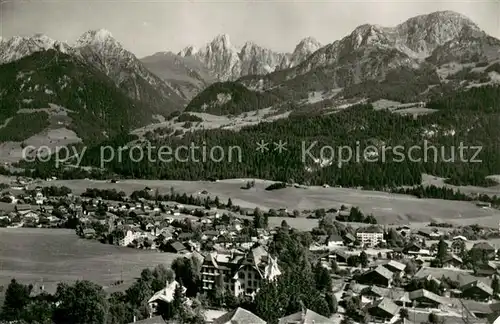 AK / Ansichtskarte Chateau d_Oex Gummfluh Rocher du Midi Alpen Fliegeraufnahme Chateau d Oex