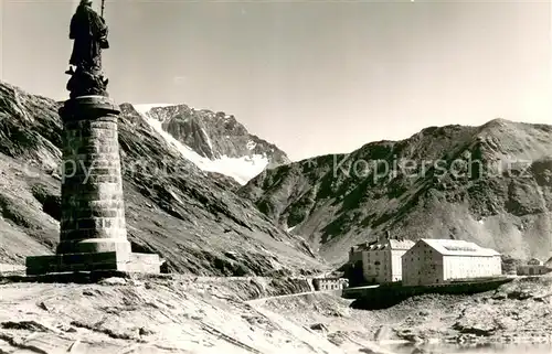 AK / Ansichtskarte Grand_Saint_Bernard Statue et hospice du Grand Saint Bernard Grand_Saint_Bernard