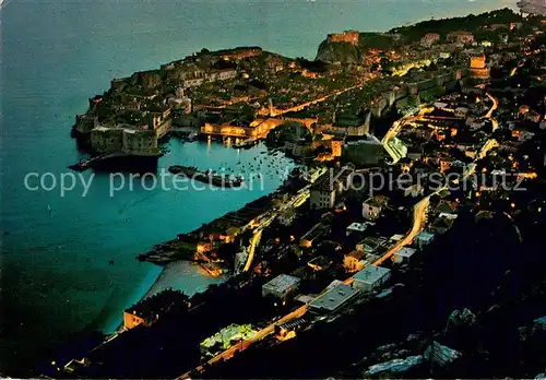 AK / Ansichtskarte Dubrovnik_Ragusa Altstadt Hafen Festung bei Nacht Dubrovnik Ragusa