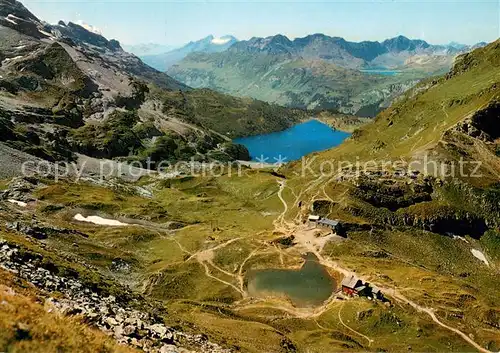 AK / Ansichtskarte Melchsee Frutt Berghaus Jochpass Blick auf Engstlensee Fliegeraufnahme Melchsee Frutt