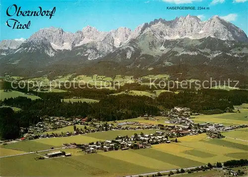 AK / Ansichtskarte Oberndorf_Tirol Fliegeraufnahme mit Sportzentrum und Kaisergebirge Oberndorf Tirol