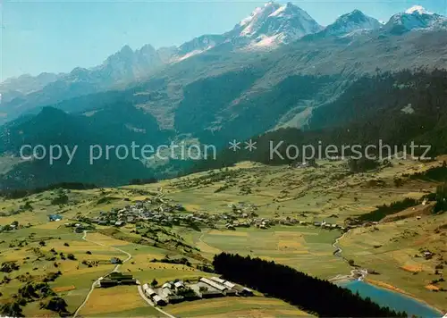 AK / Ansichtskarte Brigels im Buendner Oberland mit Piz Tumpiv Fliegeraufnahme Brigels