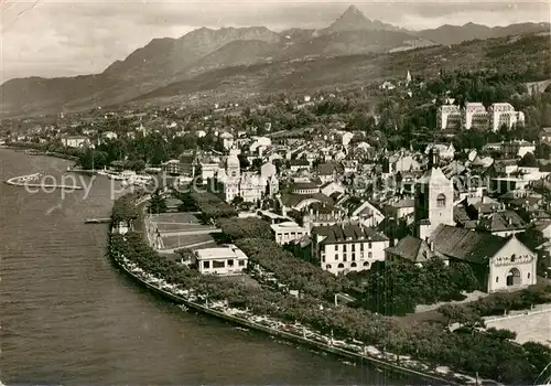 AK / Ansichtskarte Evian les Bains_Haute_Savoie Eglise Casino et le port Lac Leman dans le fond les Memises et Dent d Oche vue aerienne Evian les Bains_Haute