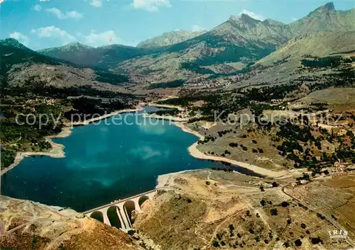 AK / Ansichtskarte Calacuccia Barrage au fond Monte Cinto vue aerienne Calacuccia