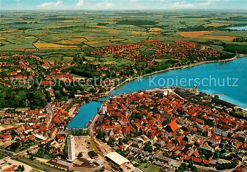 AK / Ansichtskarte Eckernfoerde Binnenhafen mit Holzbrueck und Aussenhafen Fliegeraufnahme Eckernfoerde