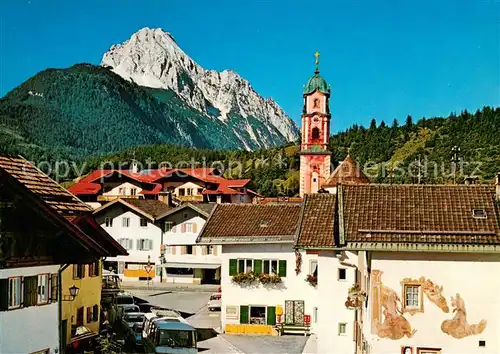 AK / Ansichtskarte Mittenwald_Bayern mit Kirche und Wettersteinspitze Mittenwald Bayern