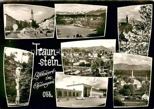AK / Ansichtskarte Traunstein_Oberbayern Stadtplatz Baumbluete Lindlbrunnen Bahnhof Panorama Alpen Traunstein_Oberbayern