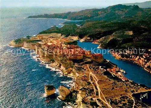AK / Ansichtskarte Bonifacio_Corse_du_Sud Sur les falaises ville fortifiee et son port vue aerienne Bonifacio_Corse_du_Sud