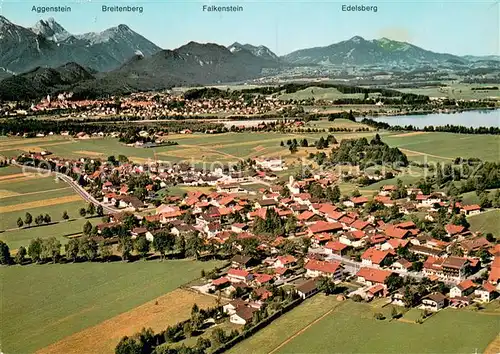 AK / Ansichtskarte Schwangau Dorf der Koenigsschloesser Alpenpanorama Fliegeraufnahme Schwangau