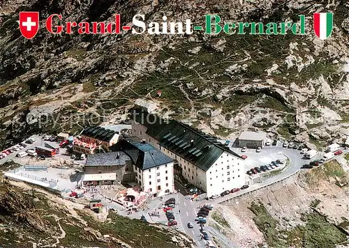 AK / Ansichtskarte Grand_Saint_Bernard Hotel de l Hospice vue aerienne Grand_Saint_Bernard