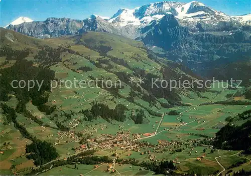 AK / Ansichtskarte Lenk_Simmental Fliegeraufnahme mit Wildstrubel Lenk Simmental