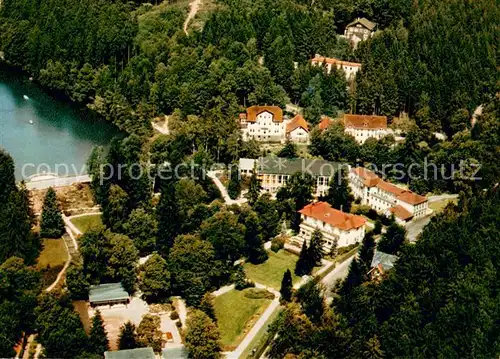 AK / Ansichtskarte Bad_Sachsa_Harz Kurpark mit Kurhaus und Schmelzteich Fliegeraufnahme Bad_Sachsa_Harz