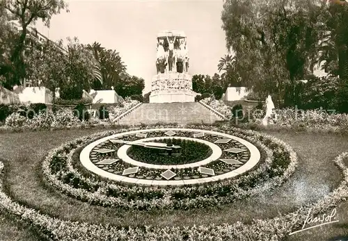 AK / Ansichtskarte Alger_Algerien Horloge Florale et le Monument aux Morts Alger Algerien