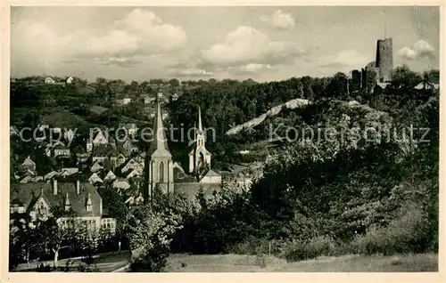 AK / Ansichtskarte Stromberg_Hunsrueck Stadtbild mit Kirche und Burgruine Stromberg Hunsrueck